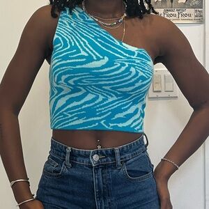 Swirly one shoulder top